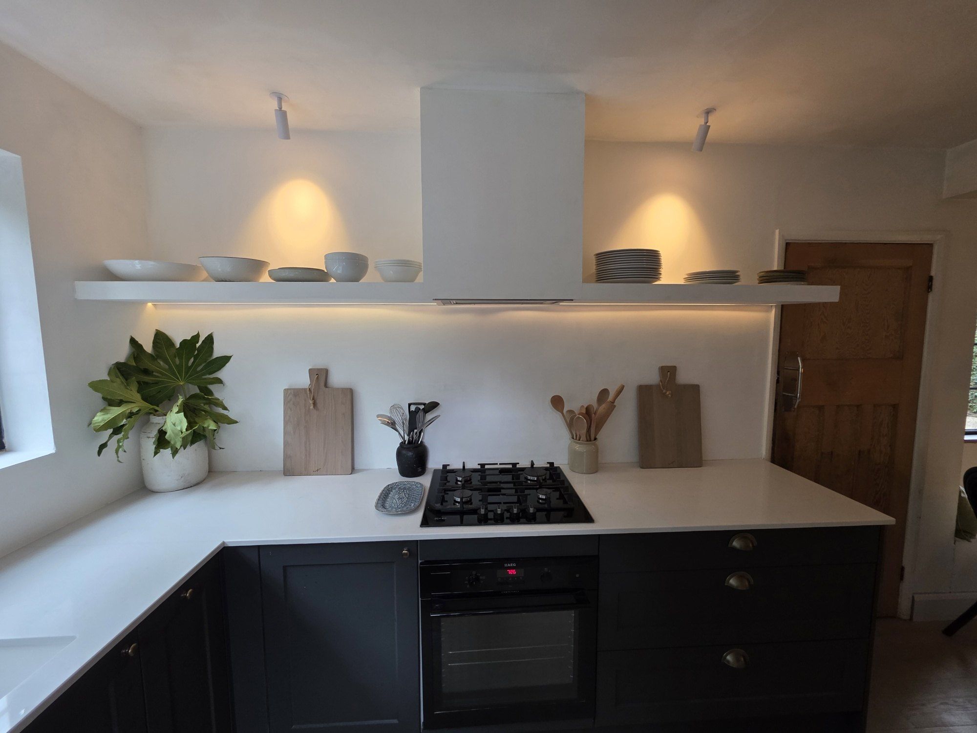 Dark kitchen open shelves